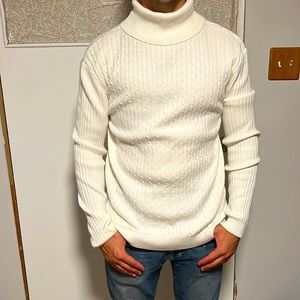 Means large white turtle neck